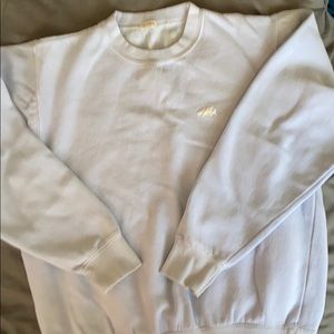 I am selling a blueish purple crew neck